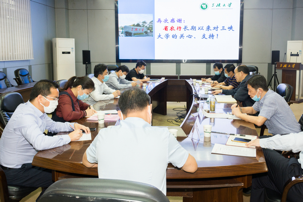 中国农业银行湖北省分行副行长刘明尧一行来访我校