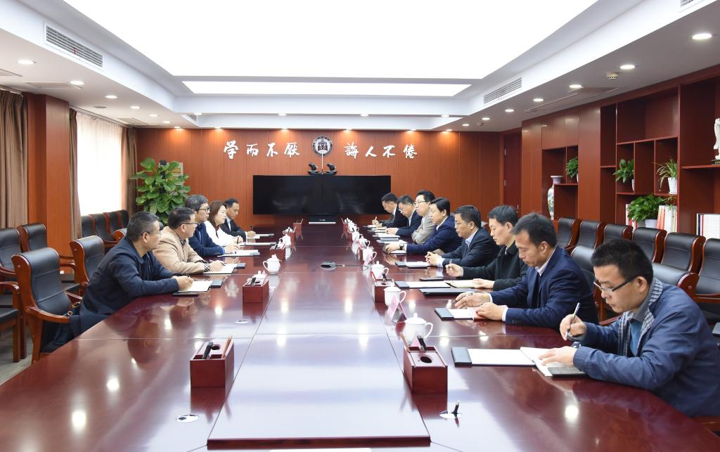 淮北师范大学校长姚佐文来校考察交流