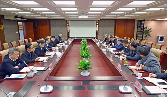 无锡市委常委、江阴市委书记许峰一行来校考察交流