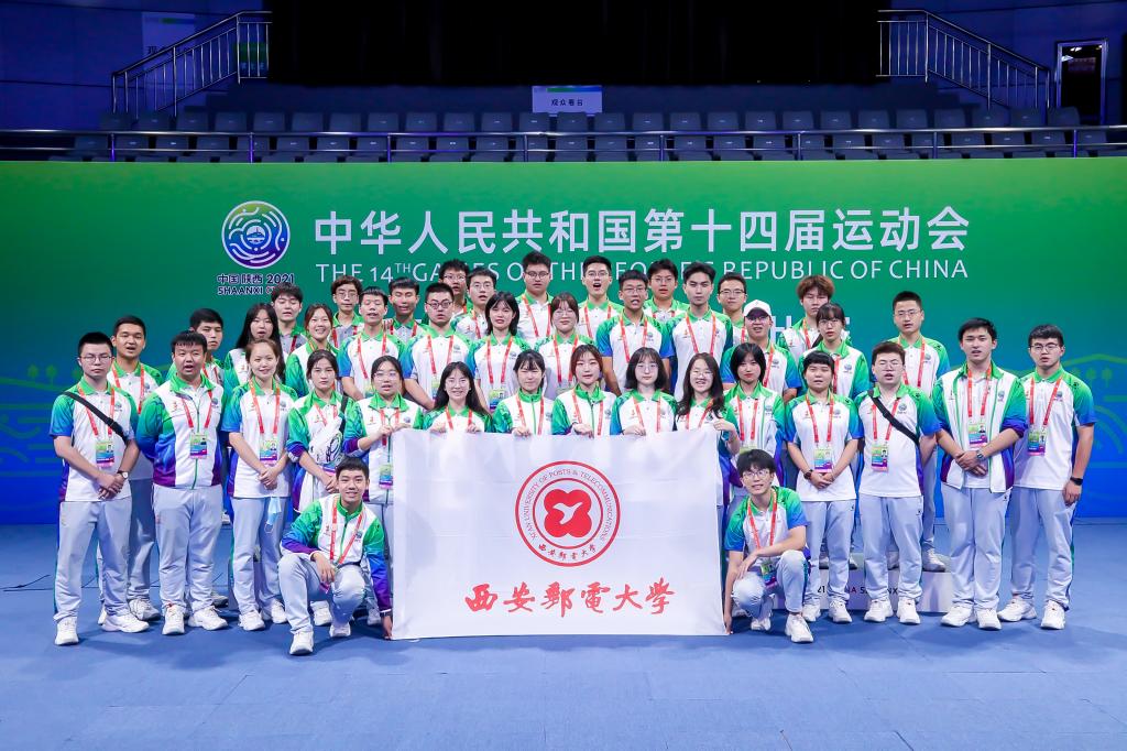 西邮“小秦宝”圆满完成十四运会羽毛球比赛志愿服务