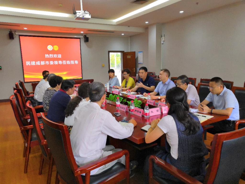 民建成都市委来校调研加装电梯工作