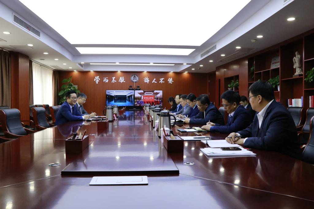澳大利亚教育管理集团总裁李新庆来校访问交流