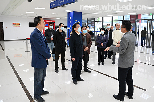 中国教科文卫体工会主席章国贤一行来校考察调研